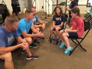 The Benhams and Jason Dellinger participate in an interview with Dayspring's Middle School Messenger reporters.