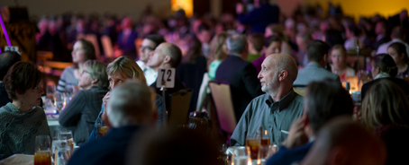 Guests listen to speaker at Remember America Speaker Series.