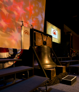 The Liberty Bell graces the stage at the 2012 Remember America Speaker Series.