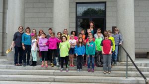 Students from Dayspring Christian Academy stand on the steps of Pilgrim Hall in Plymouth, MA.