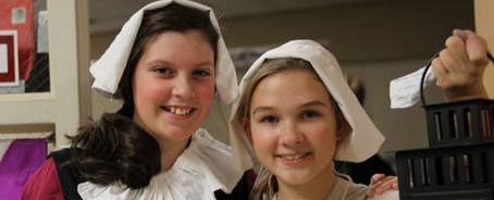 Dayspring students volunteer at Thanksgiving Exposed to show the Pilgrims' story.