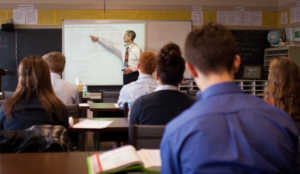 A Dayspring teacher in the classroom teaching an Advanced Math Course. Christian Education vs Public School