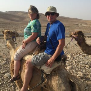 Dr. Myers, Headmaster of Dayspring Christian Academy, rides a camel with his wife as they teach seniors about the life of Jesus in Israel.