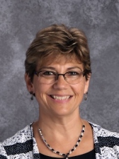 Sally Armstrong is a music teacher and lower school aide