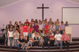 Church attendees gathered on a stage.