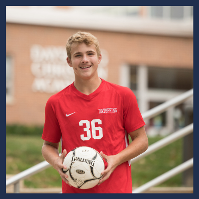 Male Christian High School Sports Team Player with Ball