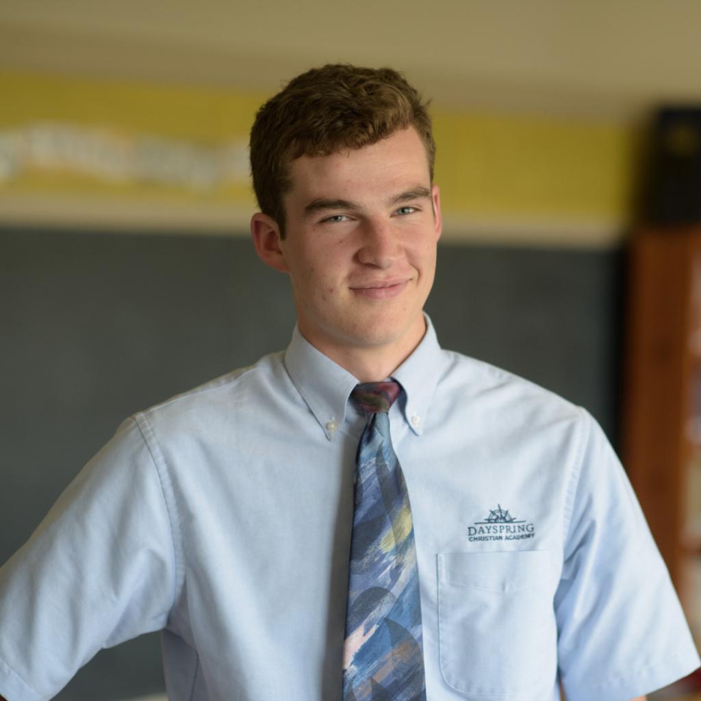 Male Honors school student smiling