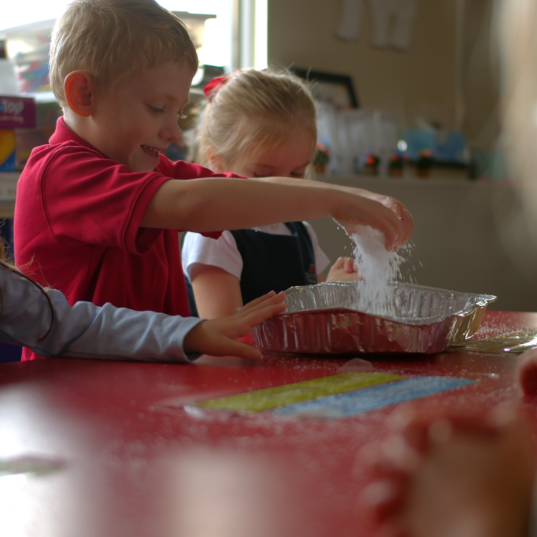 Boy and Girl Christian Preschool Students Learning Together