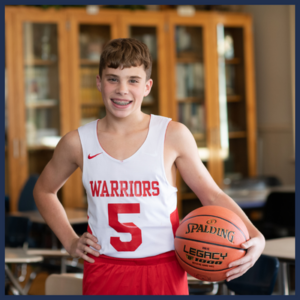 A middle school boys basketball player at Dayspring Christian Academy