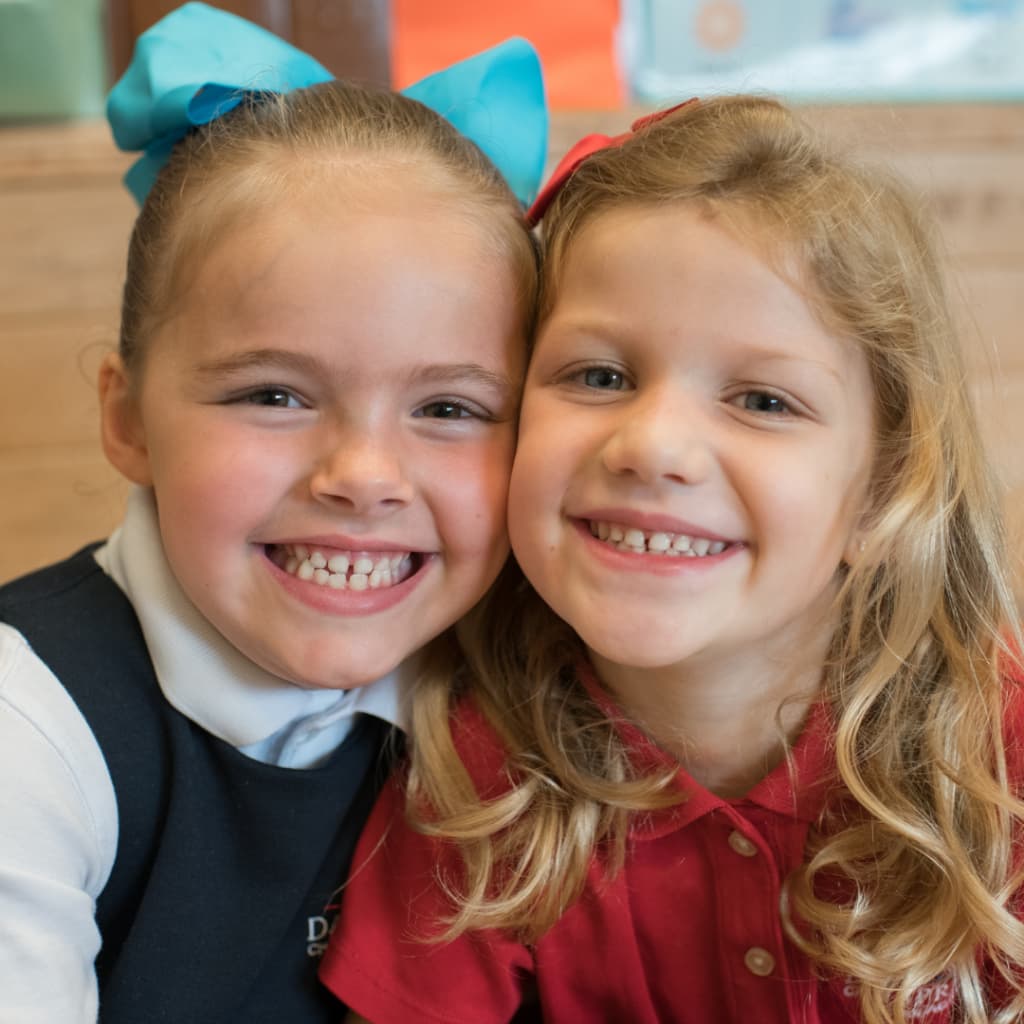 Pre-k students smiling while in class at Dayspring Christian Academy